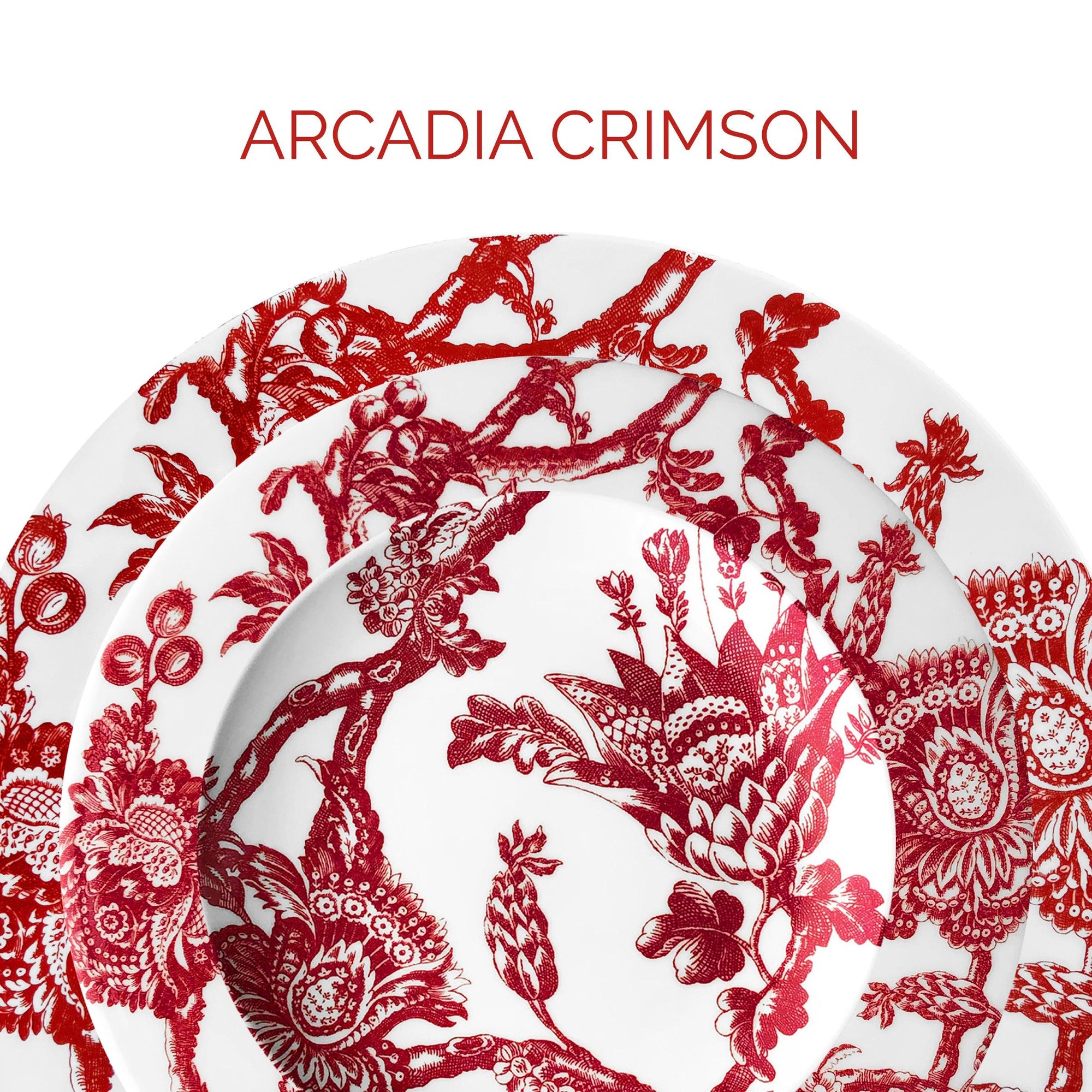 Two white plates decorated with intricate red floral patterns, labeled "Arcadia Crimson.