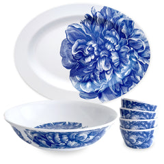 The Caskata Peony Entertaining Melamine Bundle includes a large oval plate, a round bowl, and four small bowls with a white background and blue floral peony design.