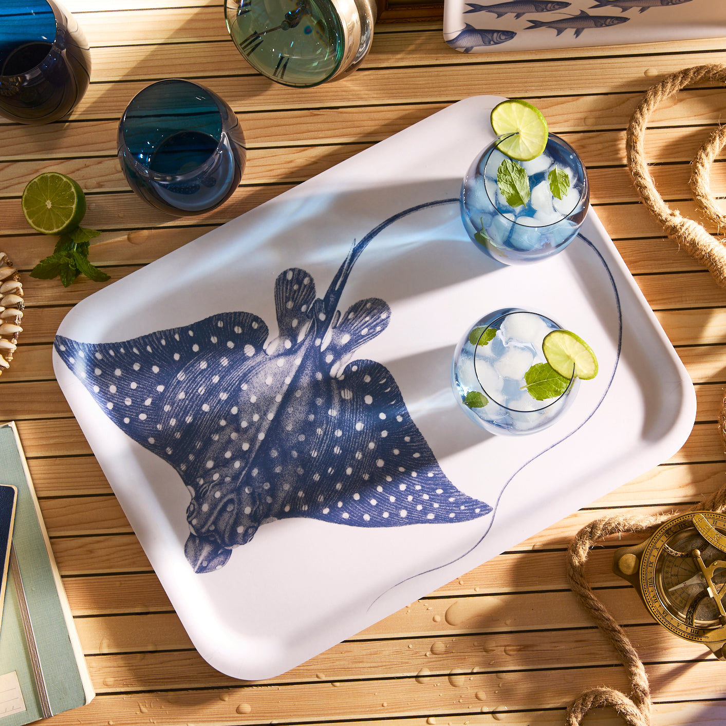 Part of Caskata's Coastal Collection, the Spotted Stingray Large Rectangular Birchwood Tray features a detailed blue spotted eagle ray illustration on a white background.