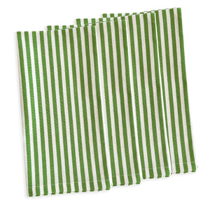 Part of the Caskata collection, the Summer Stripes Dinner Bundle features four neatly arranged green and white striped cloth napkins, perfect for a spring table refresh.