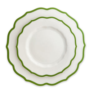 Two Stella Scalloped Verde Salad Plates by Caskata, featuring white surfaces with scalloped green edges that evoke an heirloom feel, elegantly stacked one atop the other.