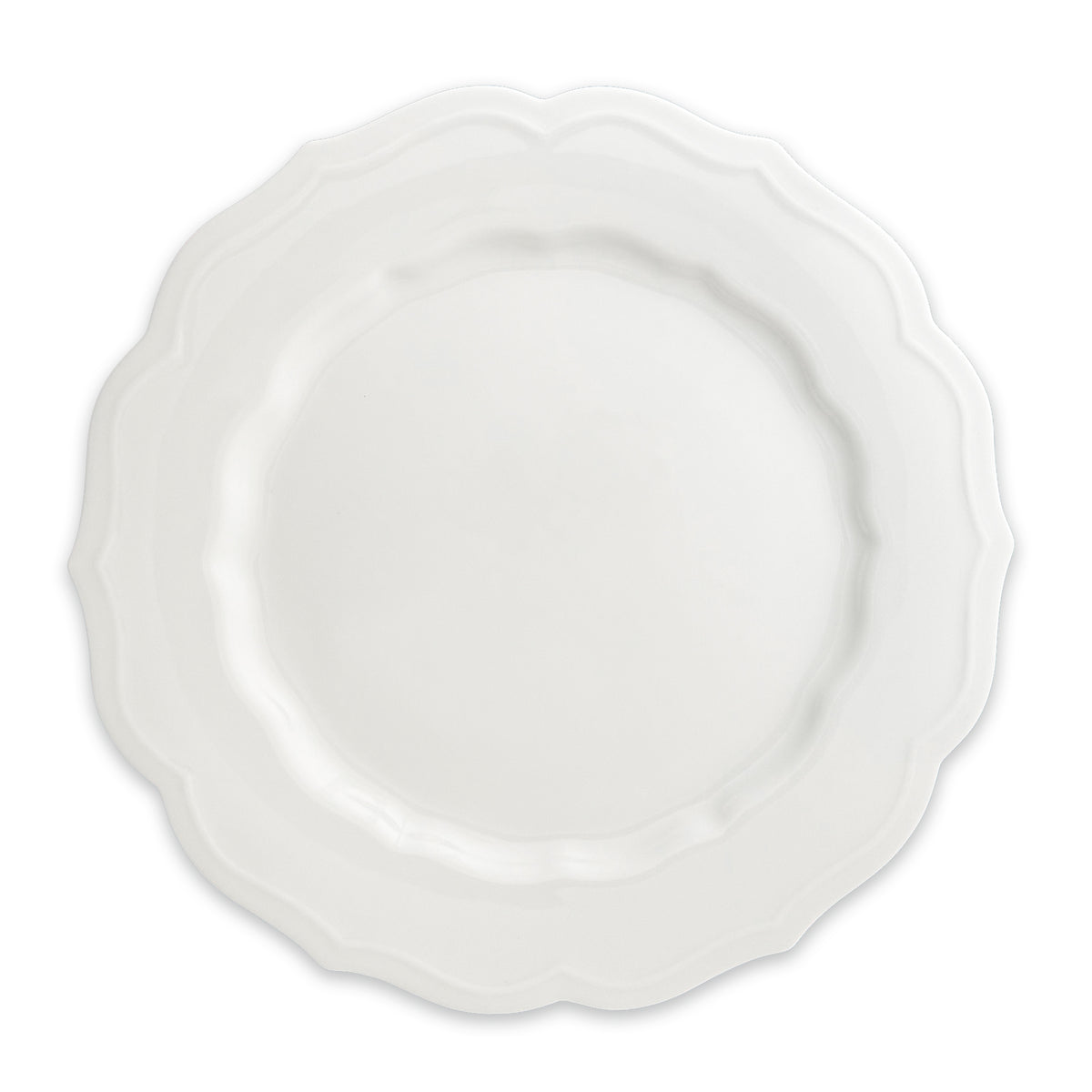 A porcelain plate with scalloped edges from Caskata&#39;s High Tide Essentials Bundle, viewed from above on a plain white background.